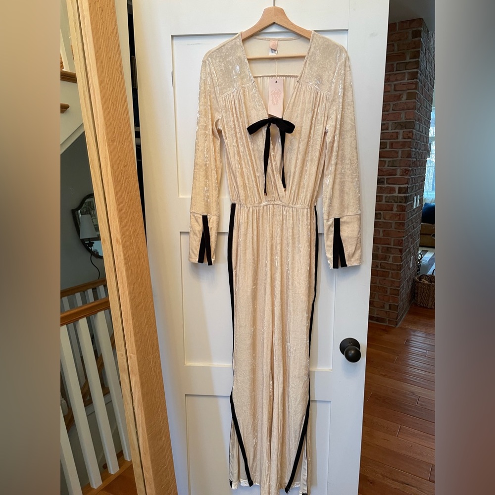 Brand new with tags We are HAH Jump On It jumpsuit